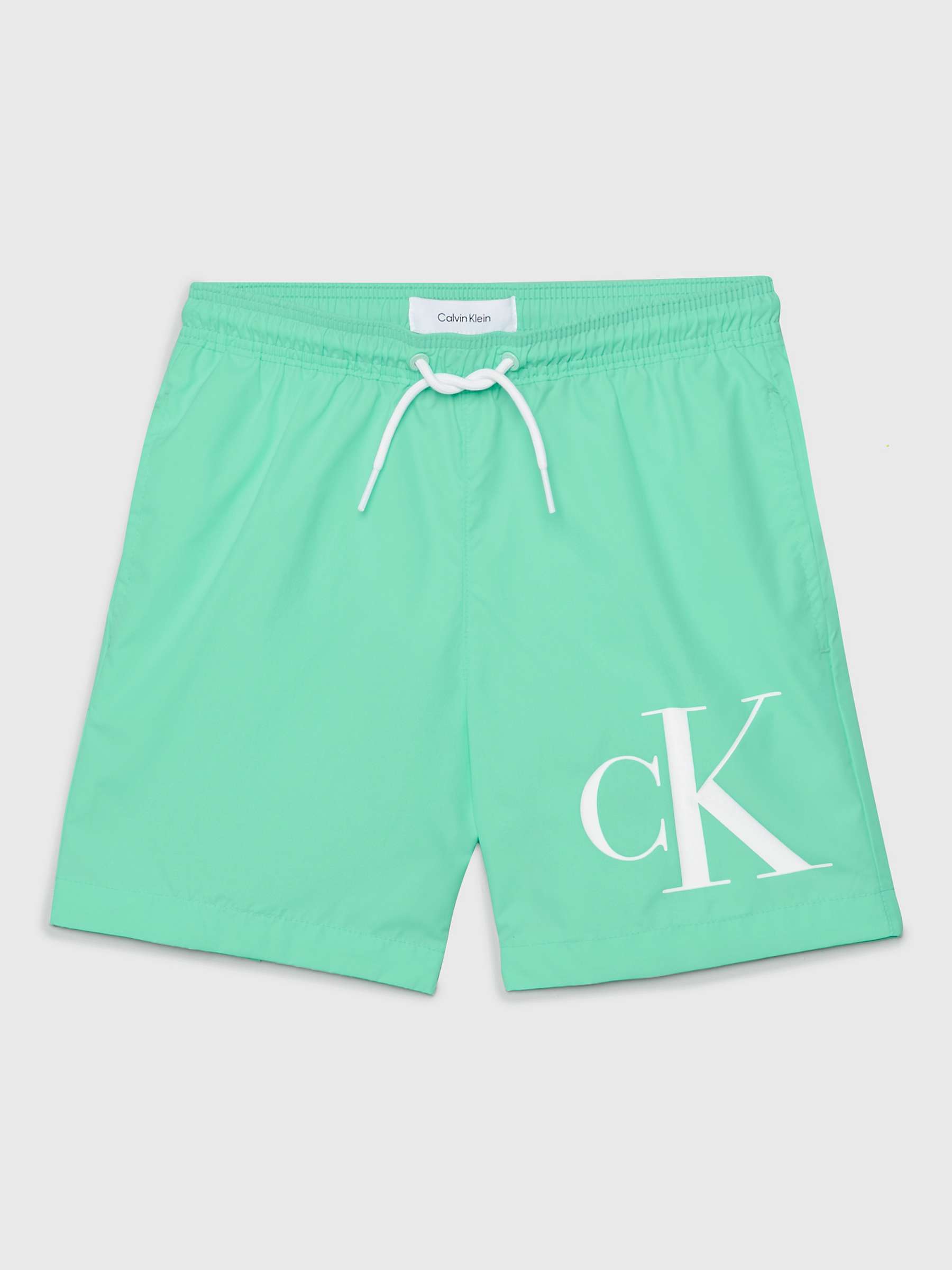 Buy Calvin Klein Kids' Graphic Logo Swim Shorts, Cabbage Online at johnlewis.com