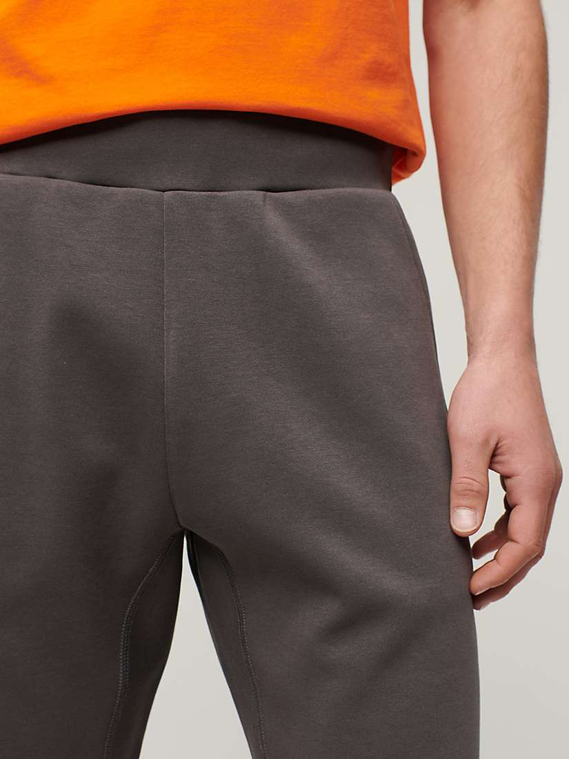 Buy Superdry Sport Tech Logo Tapered Shorts Online at johnlewis.com