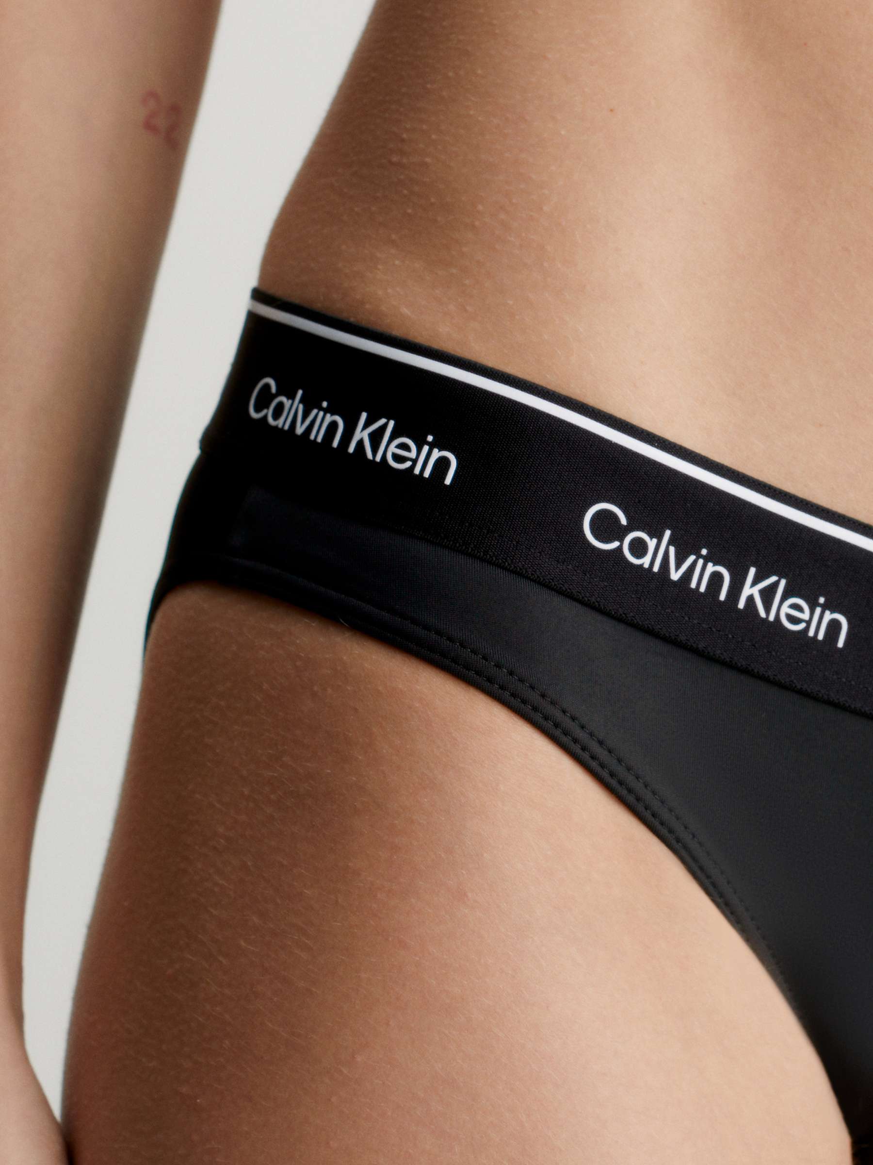 Buy Calvin Klein Logo Bikini Bottoms, Black Online at johnlewis.com