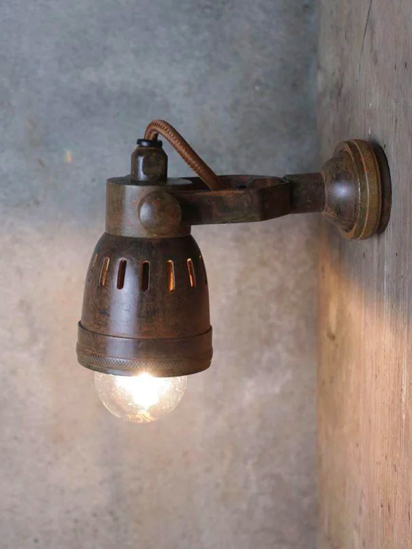 Photo of Nkuku tabosa single wall spotlight antique brass
