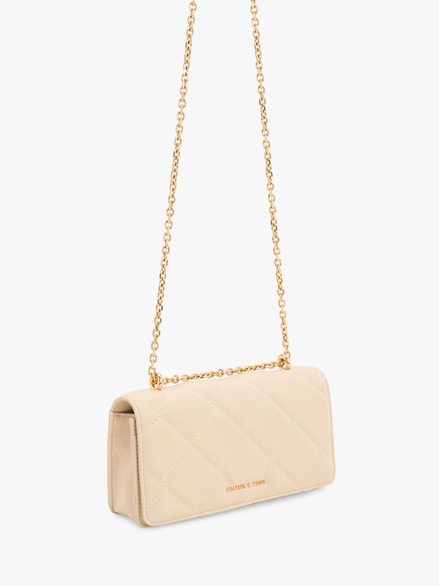 CHARLES & KEITH Paffuto Quilted Chain Strap Cross Body Bag, Beige at ...