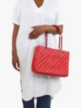 Pre-loved CHANEL 2013-2014 Caviar Leather Diamond Quilted GST Bag, Red