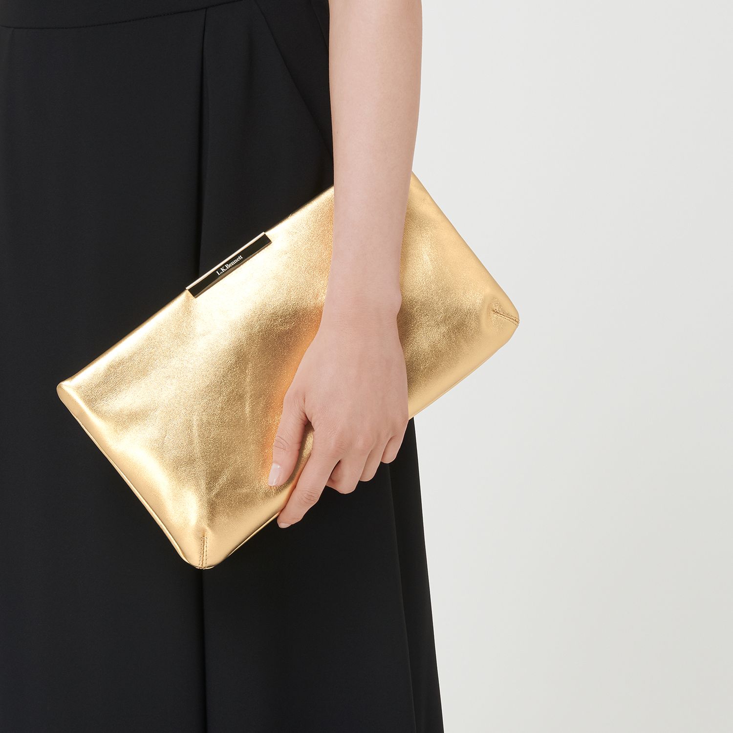 soft gold clutch bag