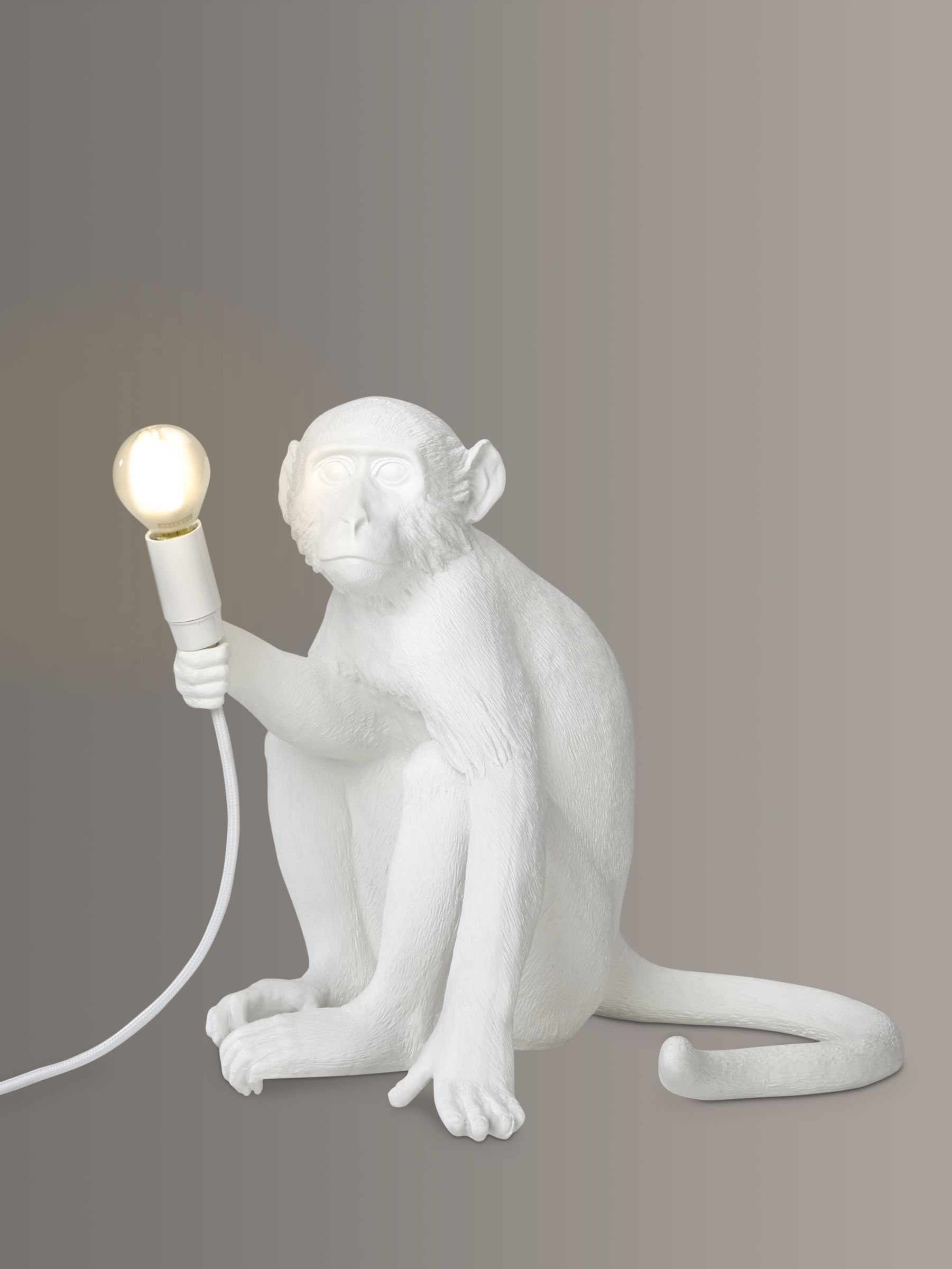 Photo of Seletti sitting monkey table lamp white