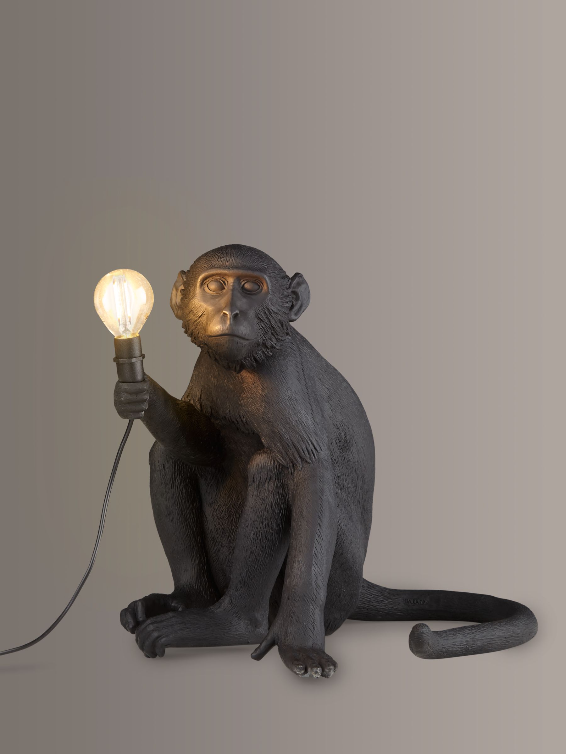 Photo of Seletti sitting monkey table lamp black