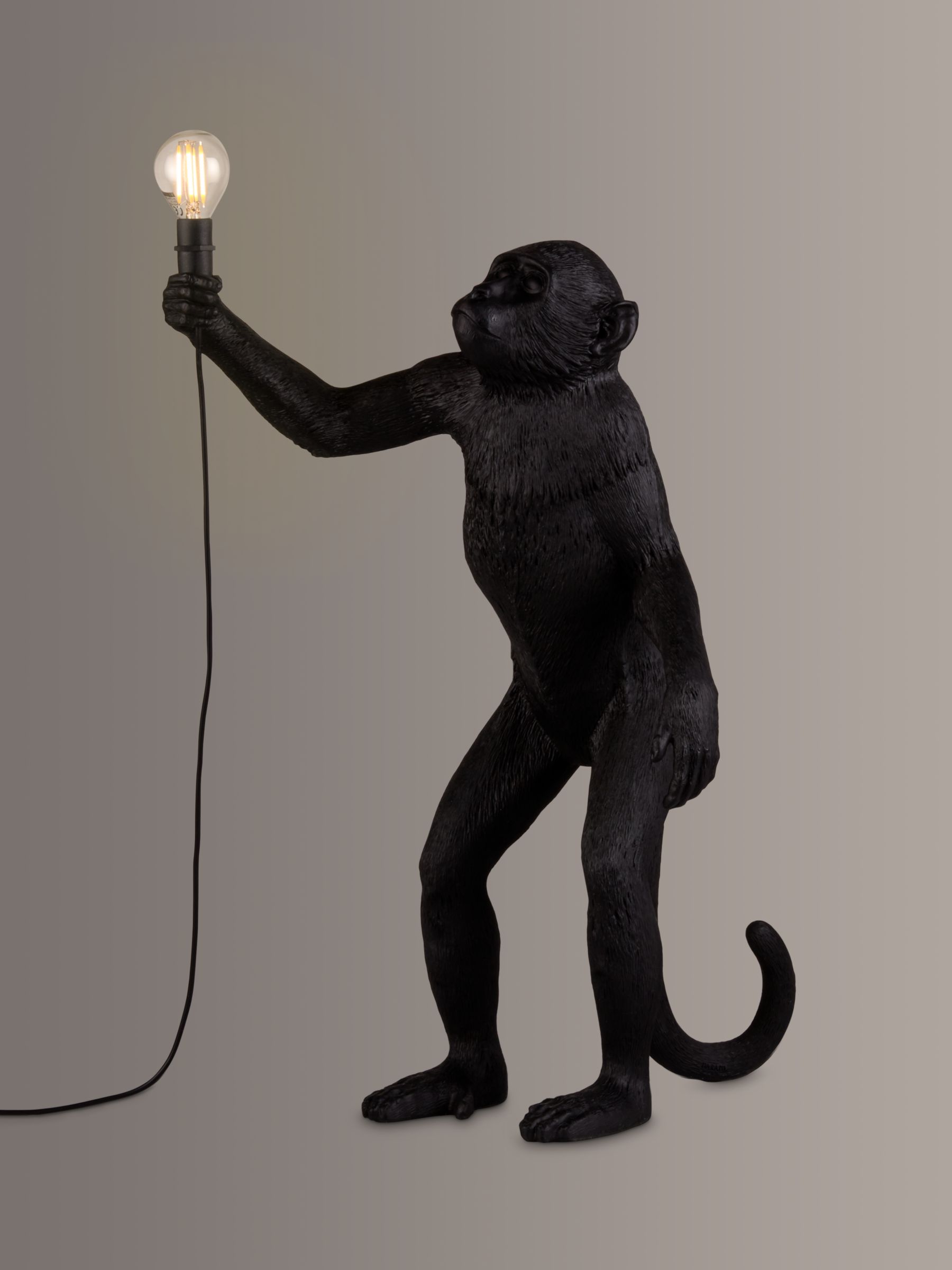 Photo of Seletti standing monkey table lamp black