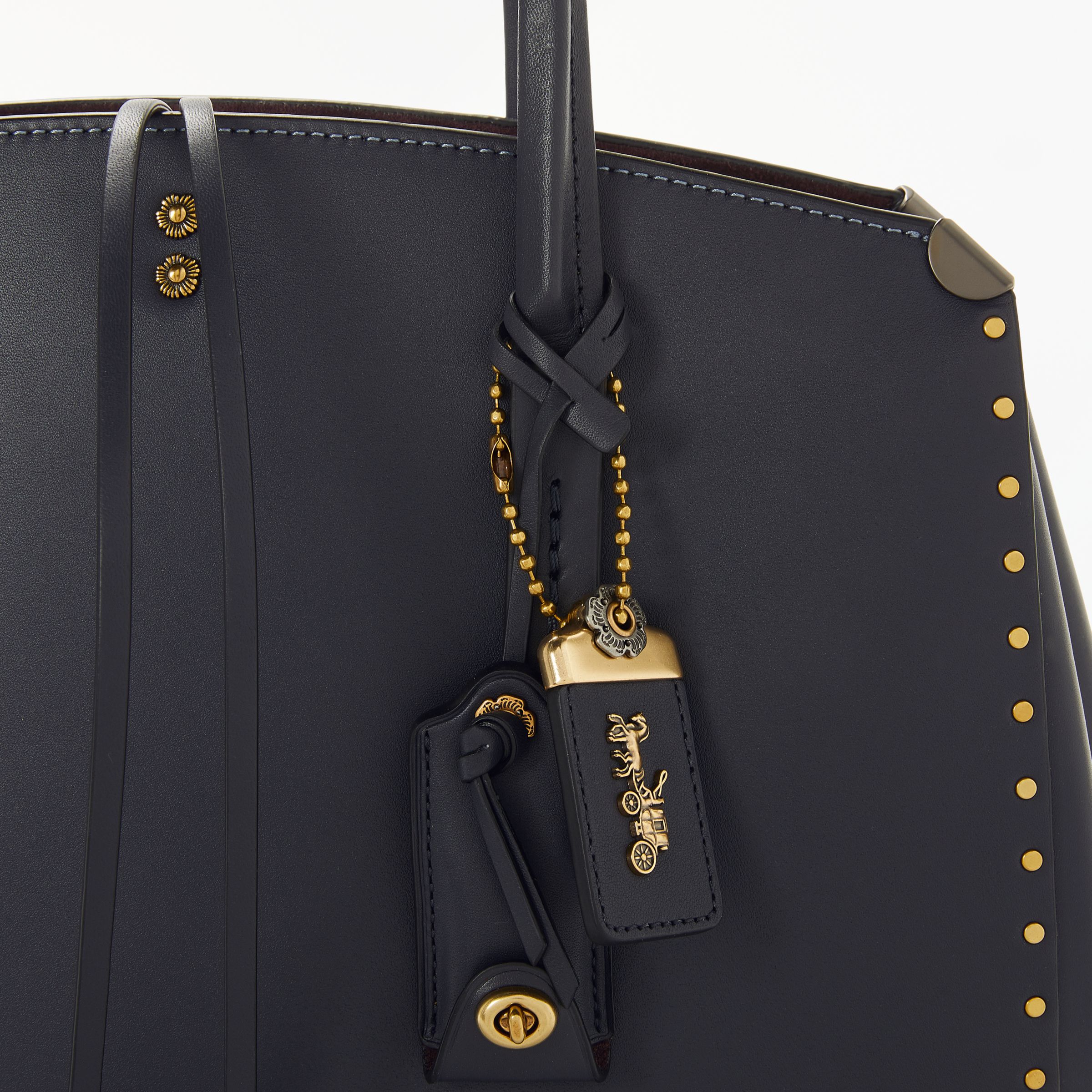 coach cooper carryall with rivets