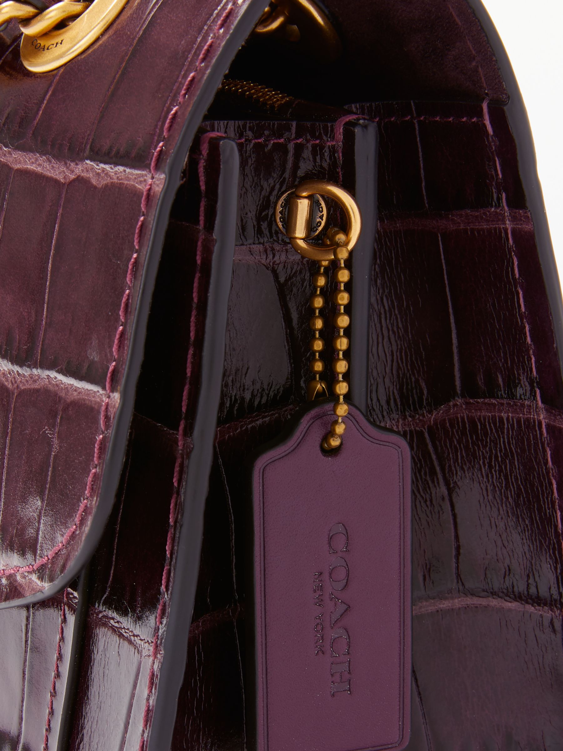 plum coach bag