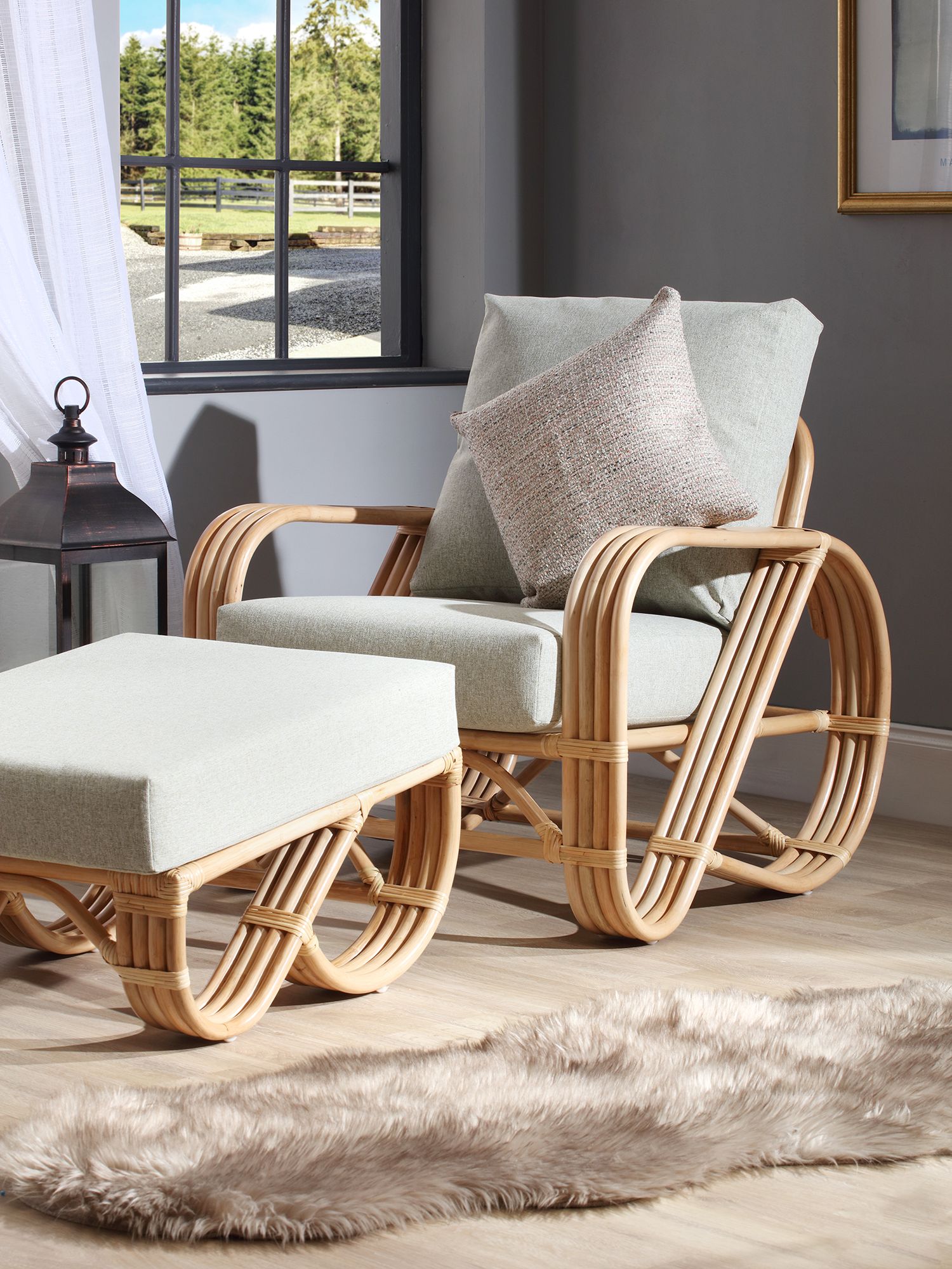 Photo of Desser pretzel rattan lounge chair & footstool natural