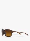 Oakley OO9297 Women's She's Unstoppable Polarised Oval Sunglasses, Brown/Brown Gradient