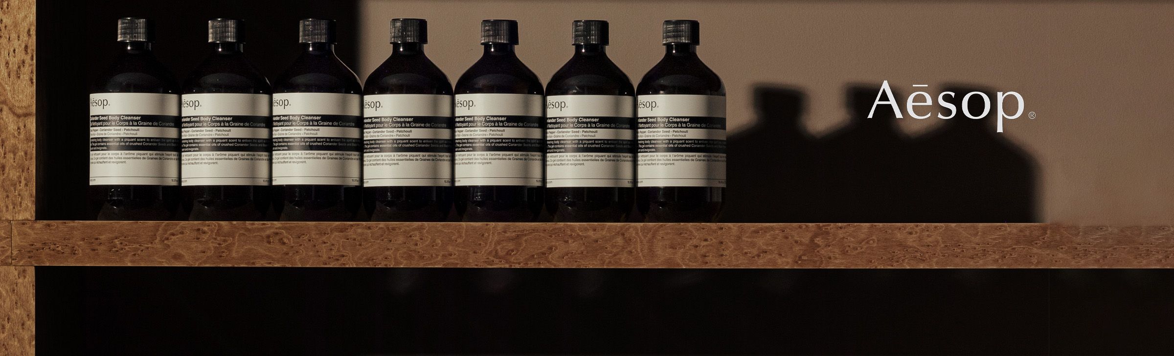 Aesop bottles, all aligned in a row