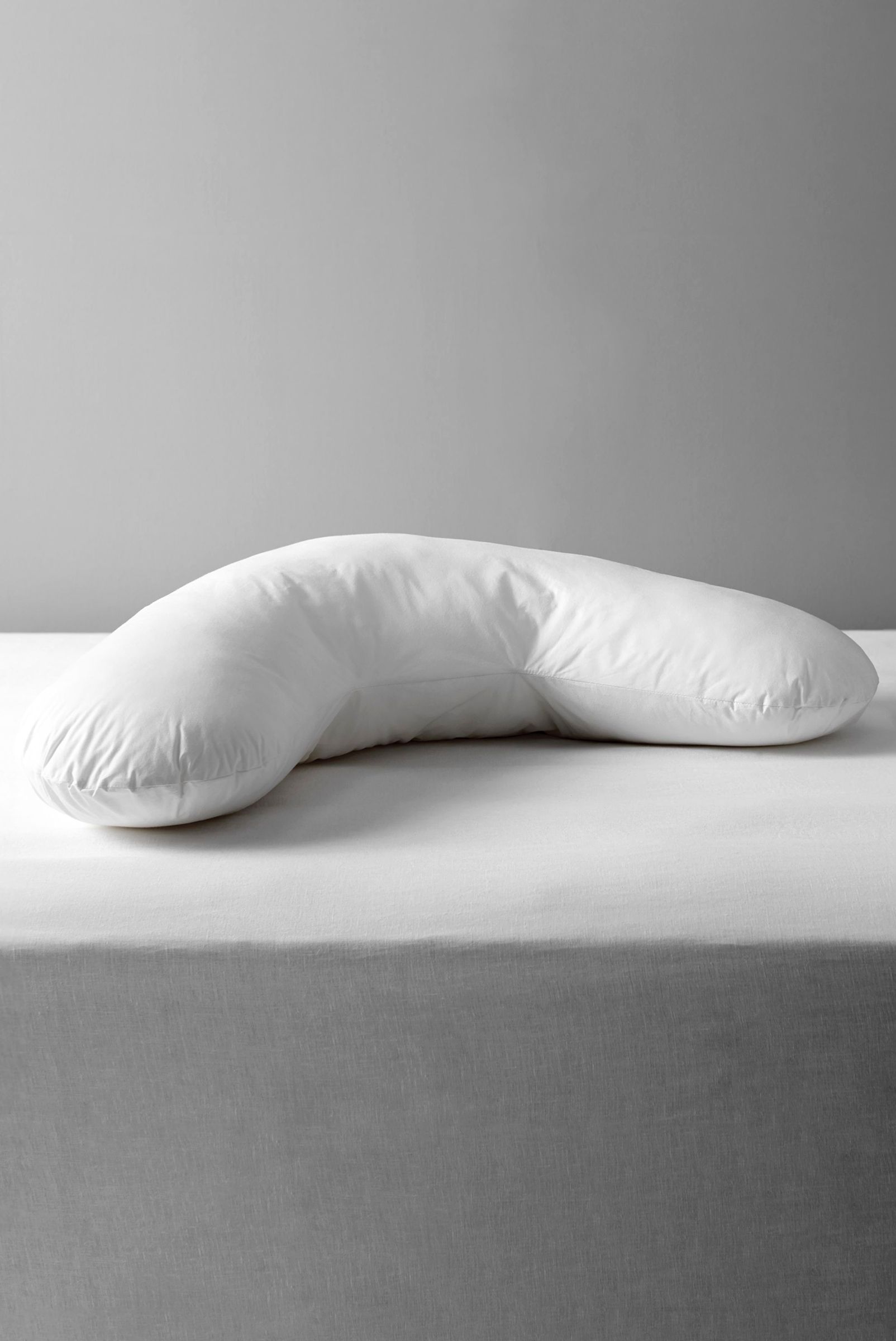 John Lewis Specialist Synthetic Carefree Comfort Teflon V-Shaped Support Pillow, £32.00