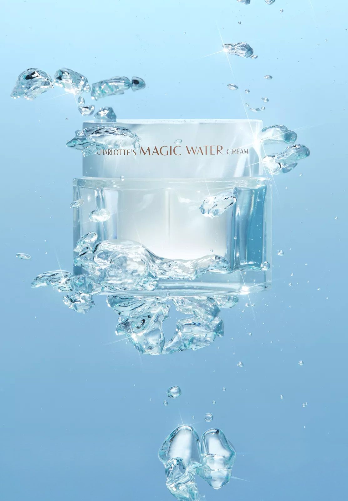 product shot of charlotte tilburys magic water cream submerged in water