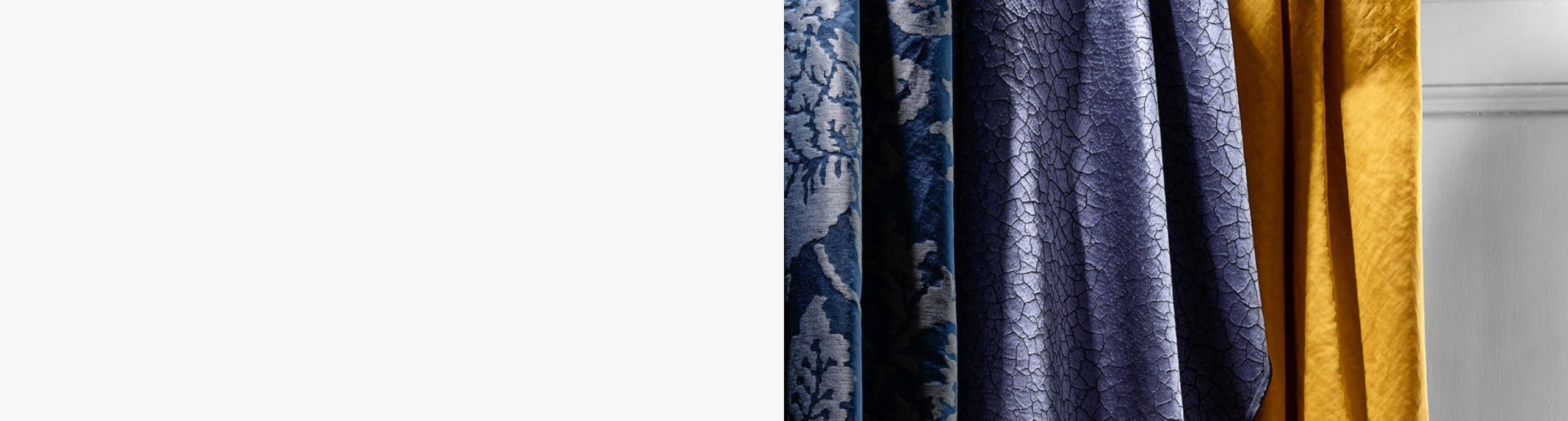a close up crop of luxurious curtains