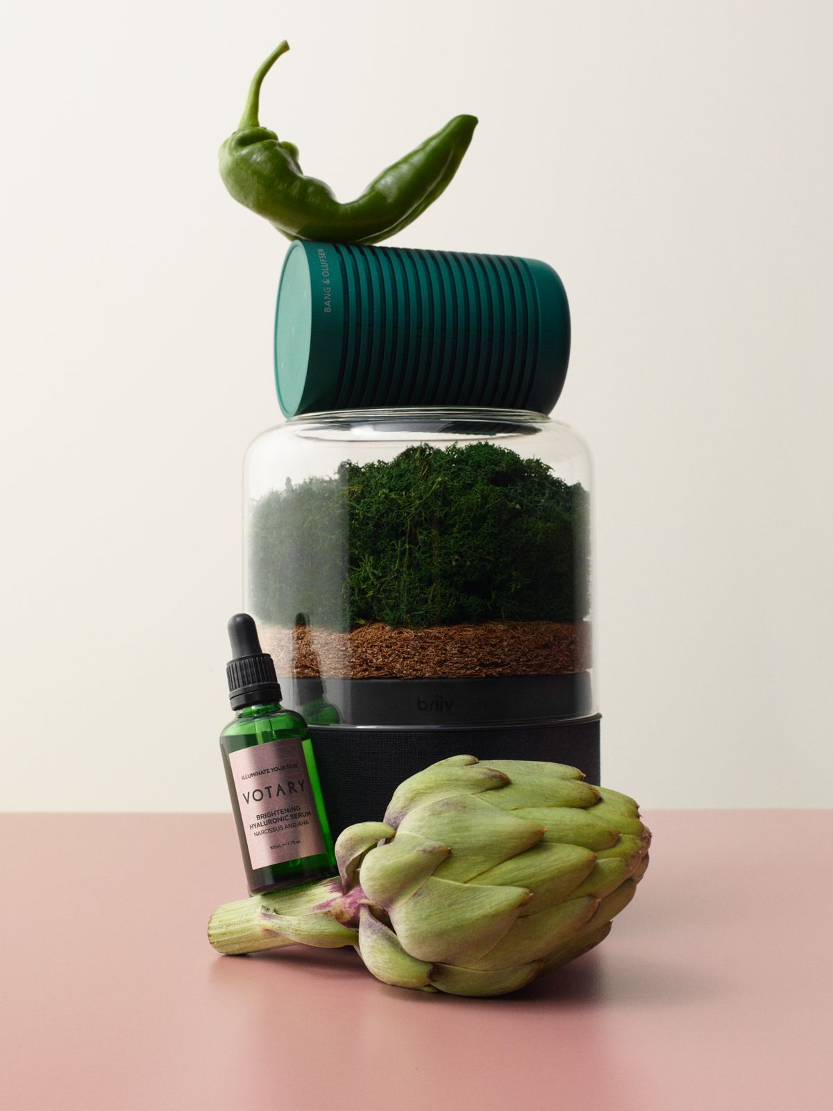 Image of a Votary product stacked on a globe artichoke