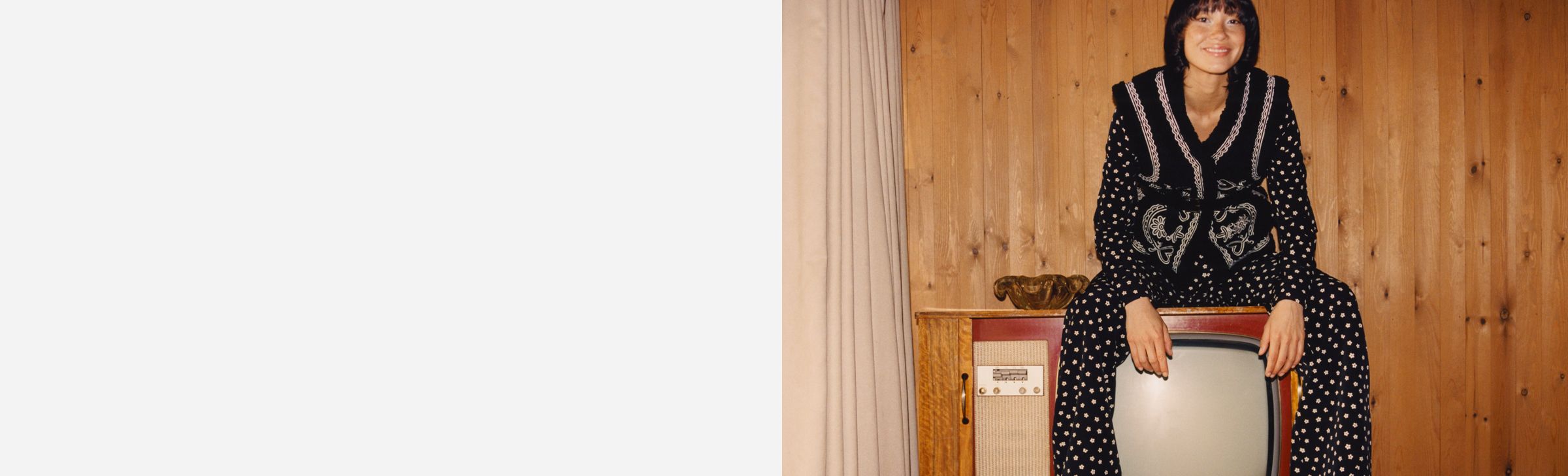 a wonen wearing fabienne_chapot clothing sitting in a wooden room