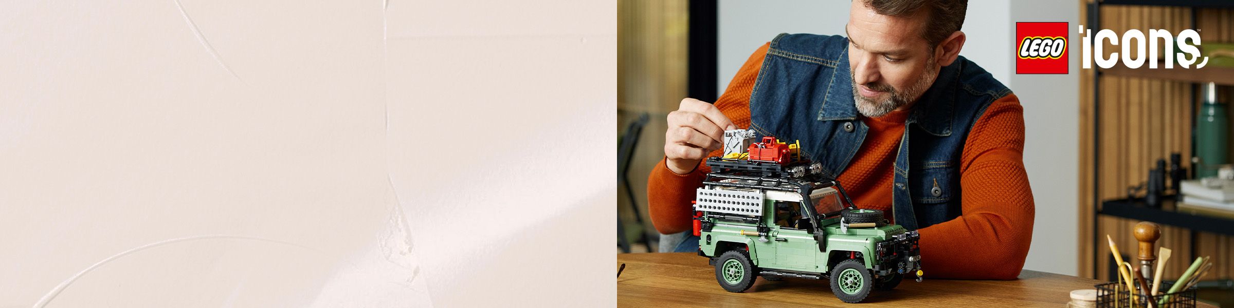 Lego icons - Man sitting at table with top lego four wheel drive car