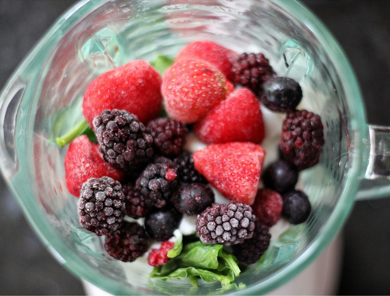 Delicious summer berries in a food processor jug