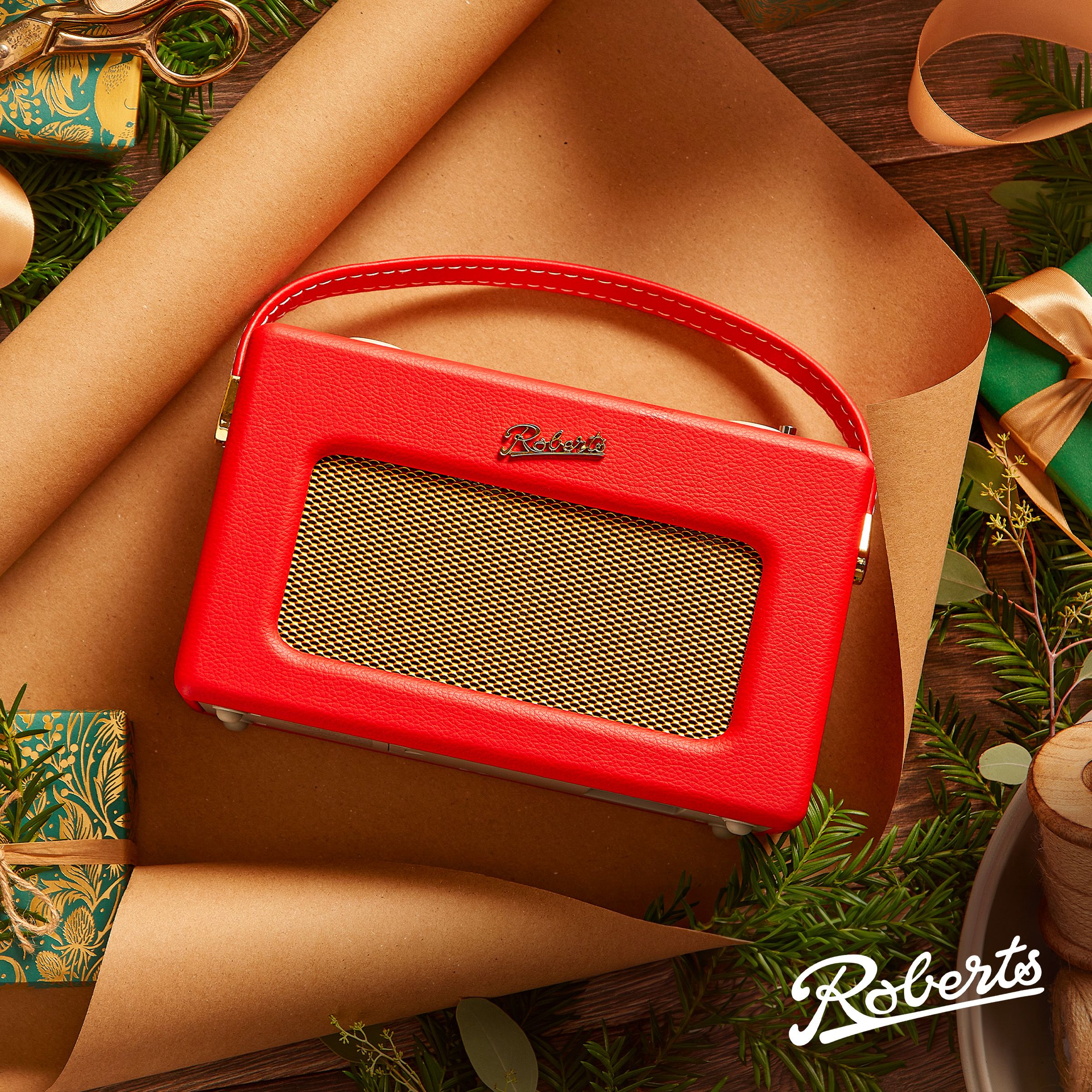 Roberts bluetooth radio sitting on gift wrapping paper