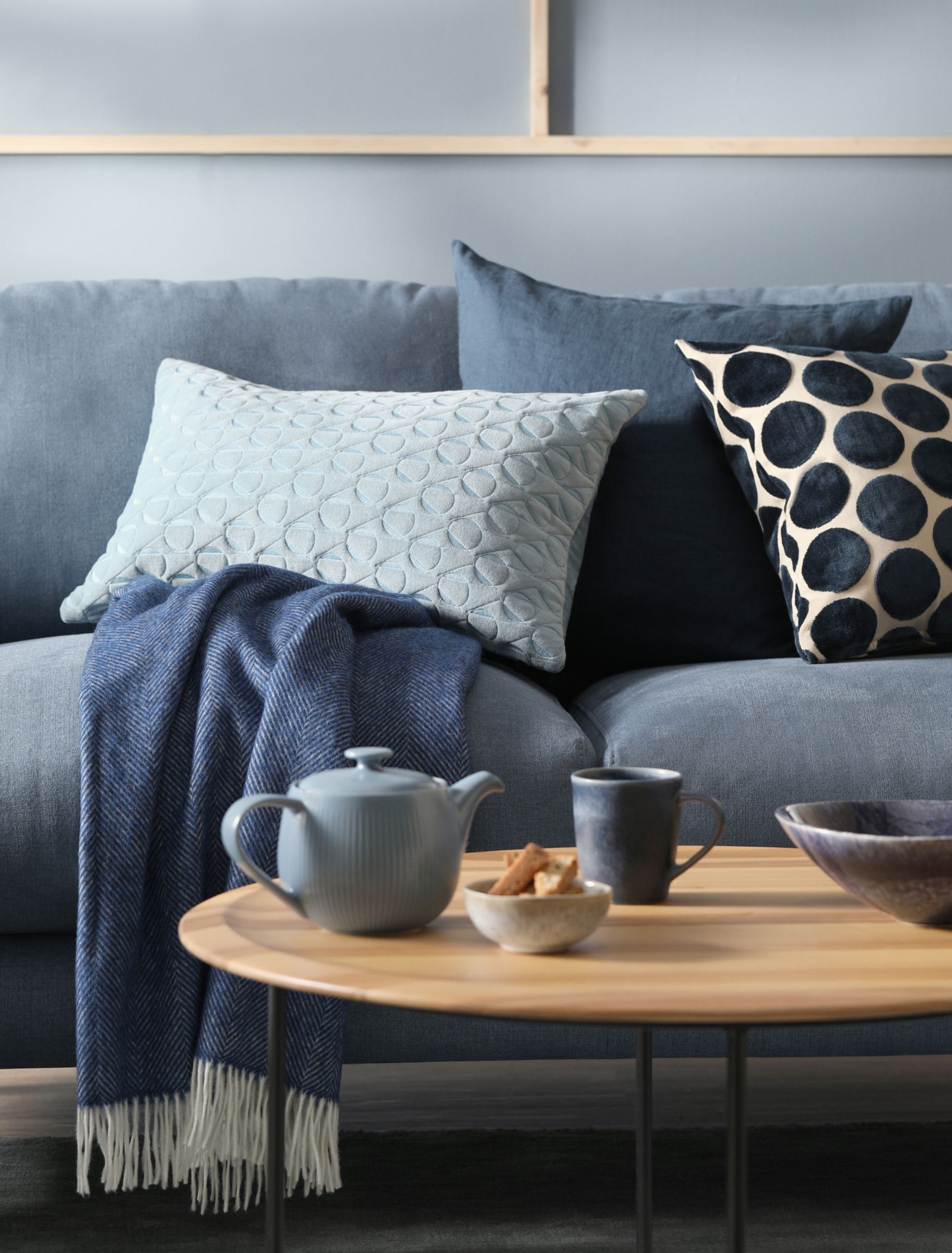 sofa with spot print cushions