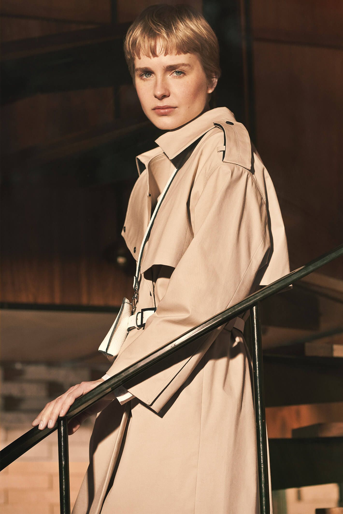 Modern Neutrals: Model in a camel trench coat