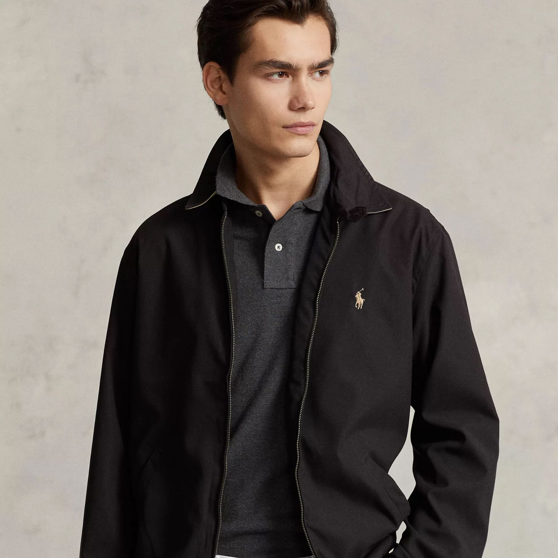 Man wearing dark windbreaker