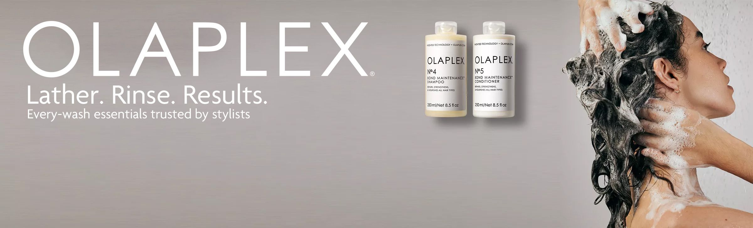 Olaplex products & lady washing her hair