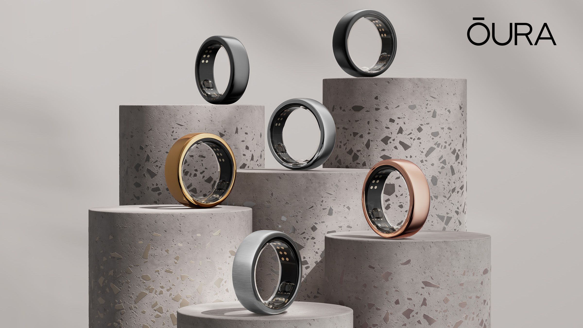 Oura rings on stone pedestals