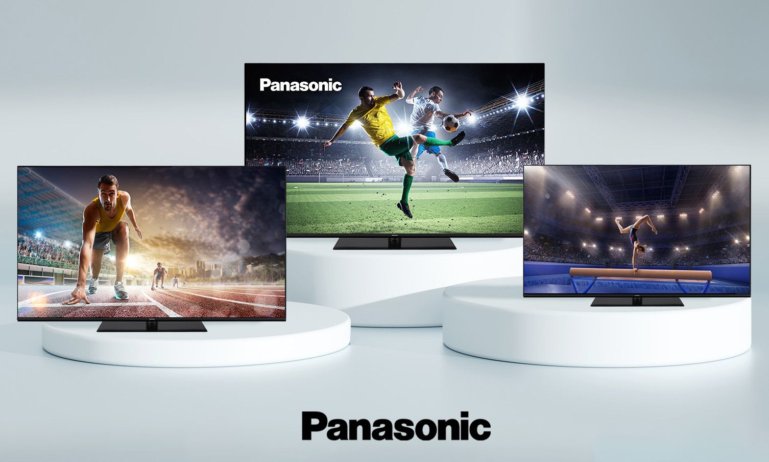 Three Panasonic Tvs on pedestals