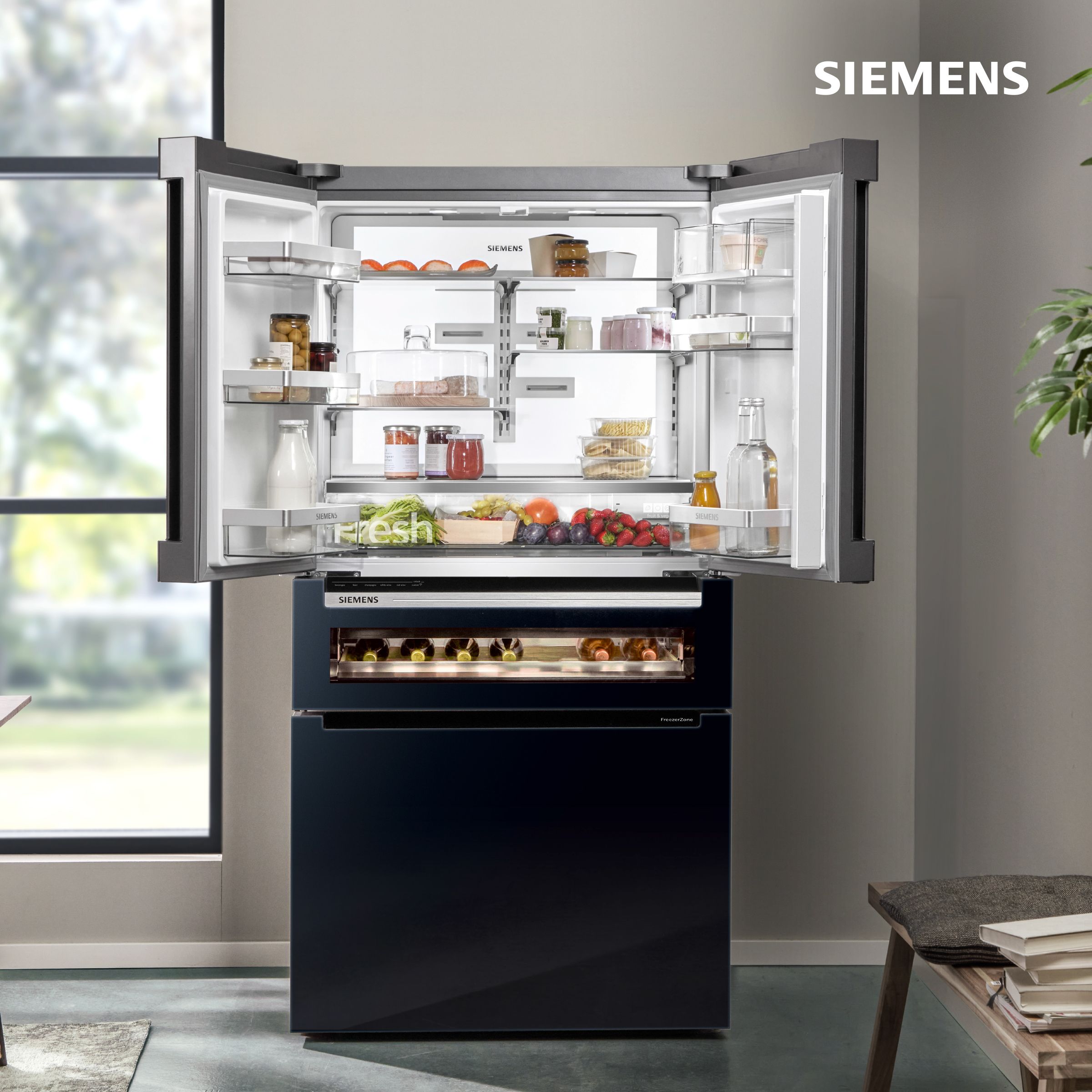 Keep it cool with Siemens - lifestyle shot of a Siemens fridge fully stacked in a kitchen