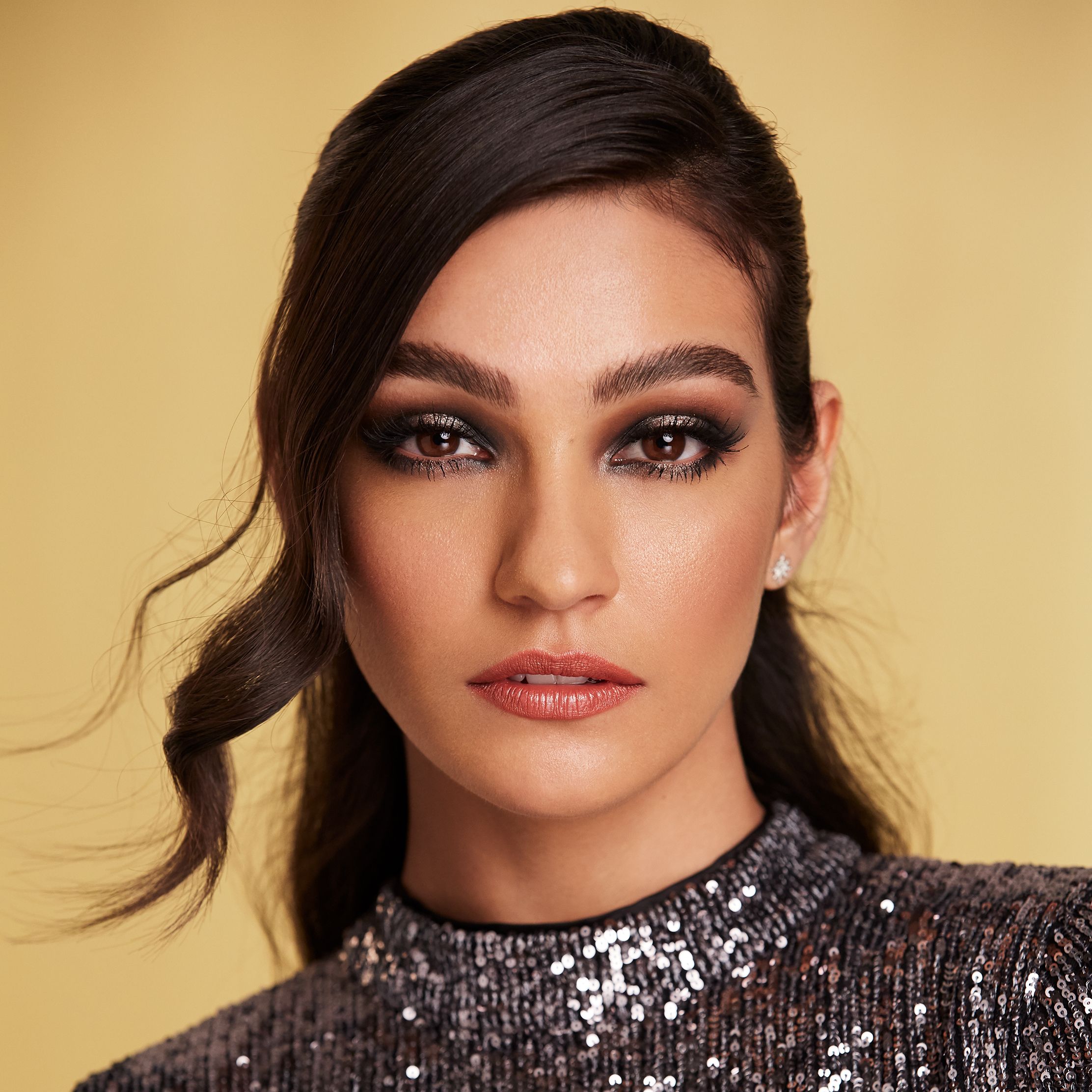 Model with sparkly eye make-up
