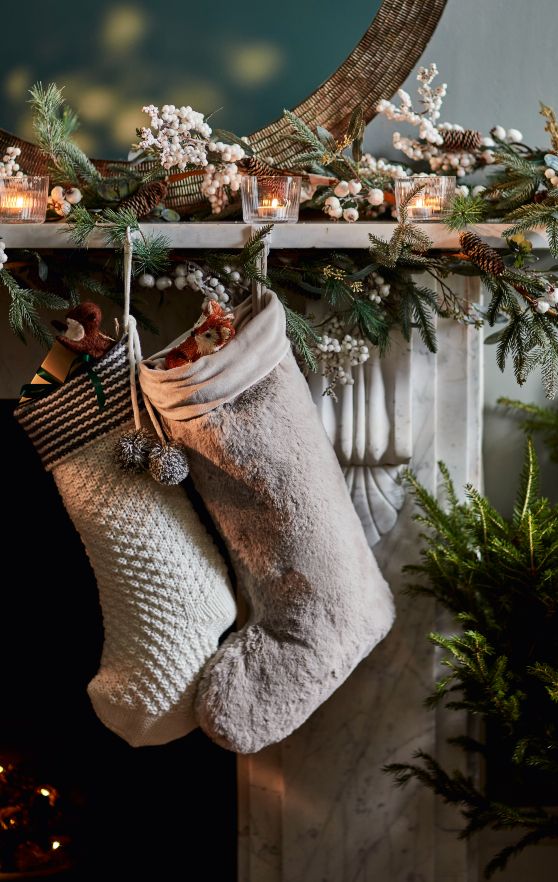 Stockings hanging on a fireplace