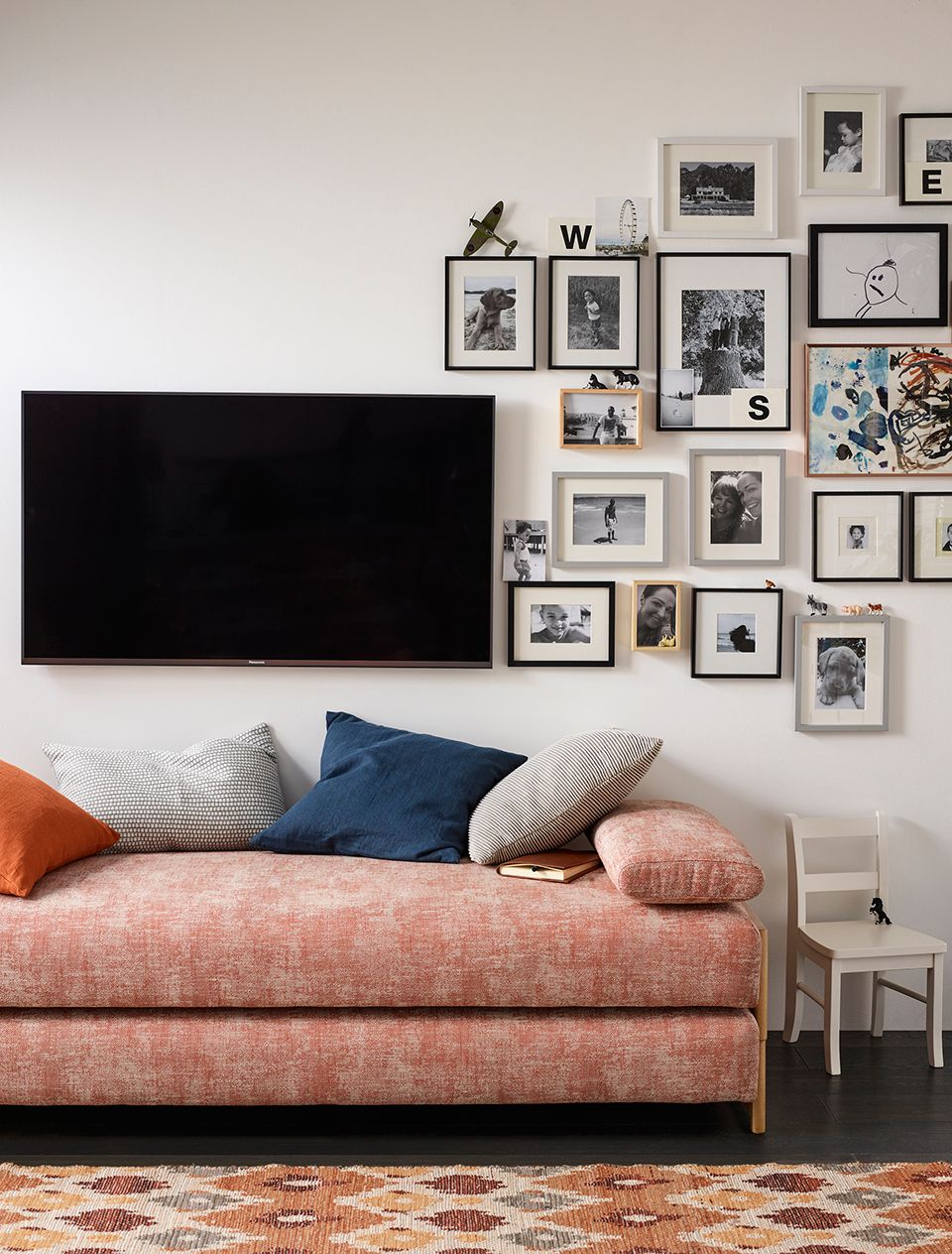 Picture gallery wall with TV