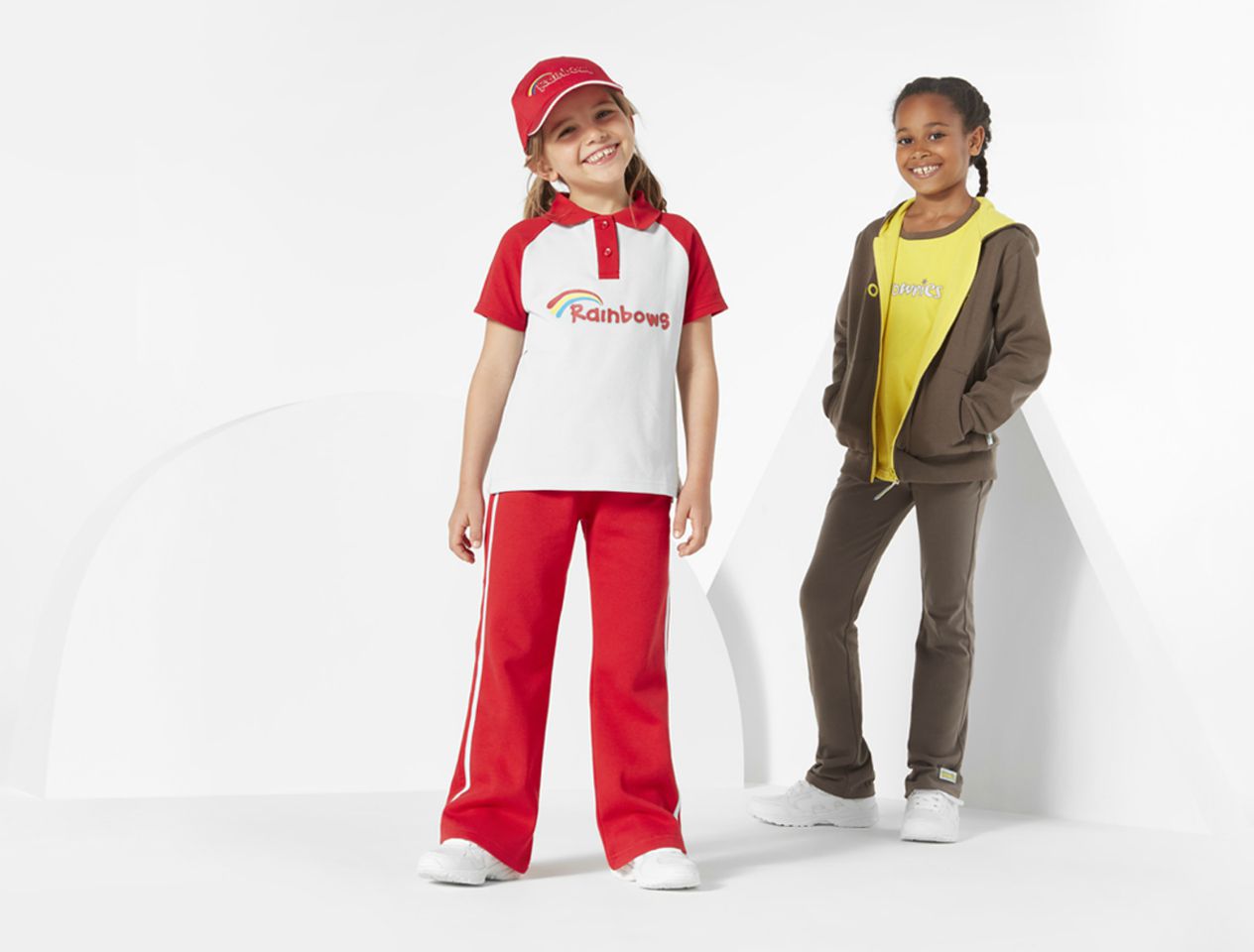 Girls wearing girl guiding outfits available at John Lewis & Partners