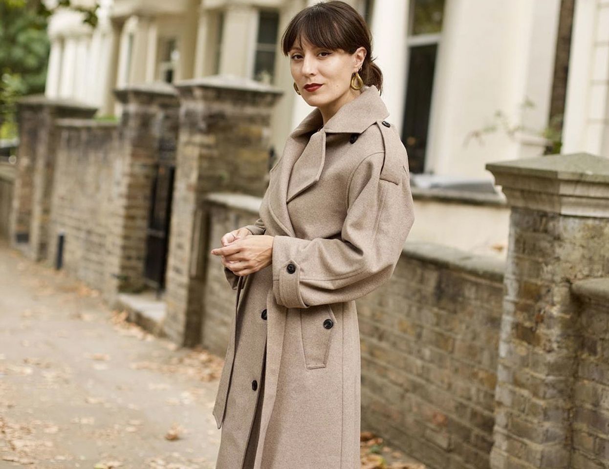 Katherine Ormerod in a camel coat by Modern Rarity